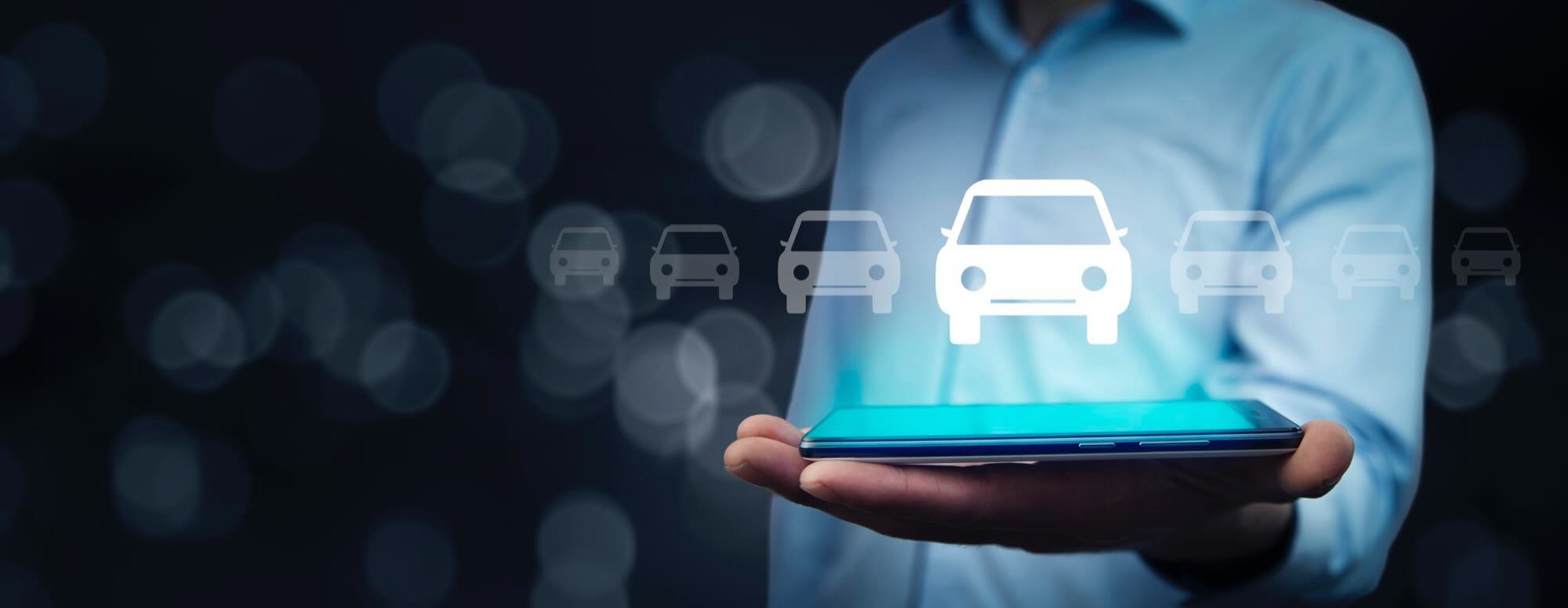 man-hand-car-model-with-tablet-screen